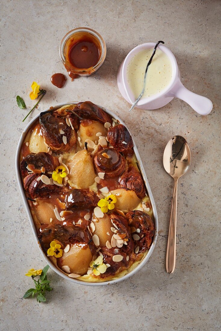 Bread and butter pudding with poached pears and caramel
