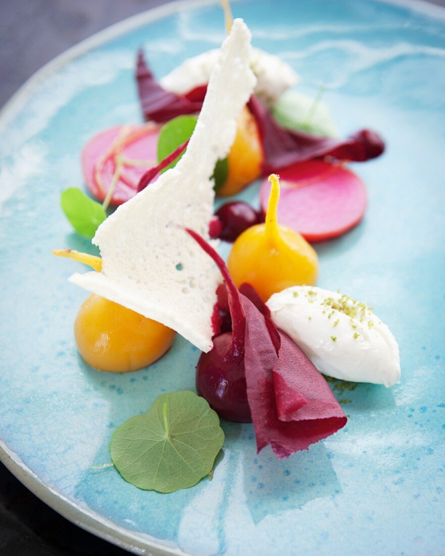 Goats' cheese chantilly cream with pickled red and yellow beetroot