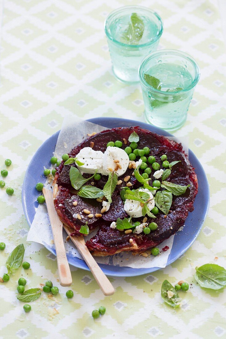 Tarte tatin with beetroot, goat's cheese, peas and mint