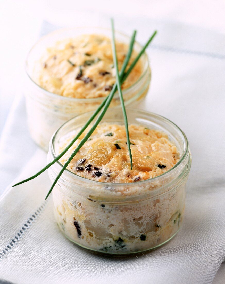 Fish terrine in a glass with chives