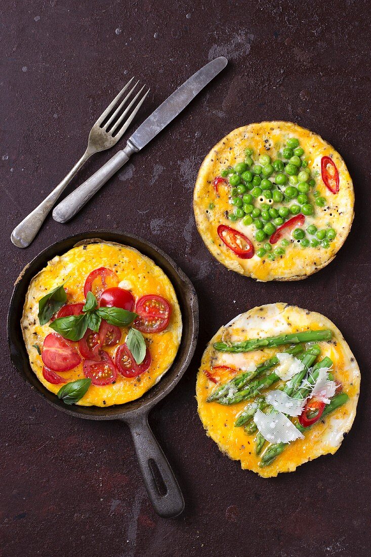 Assorted mini frittatas (cherry tomato and basil, pea and chilli pepper and asparagus and Parmesan)