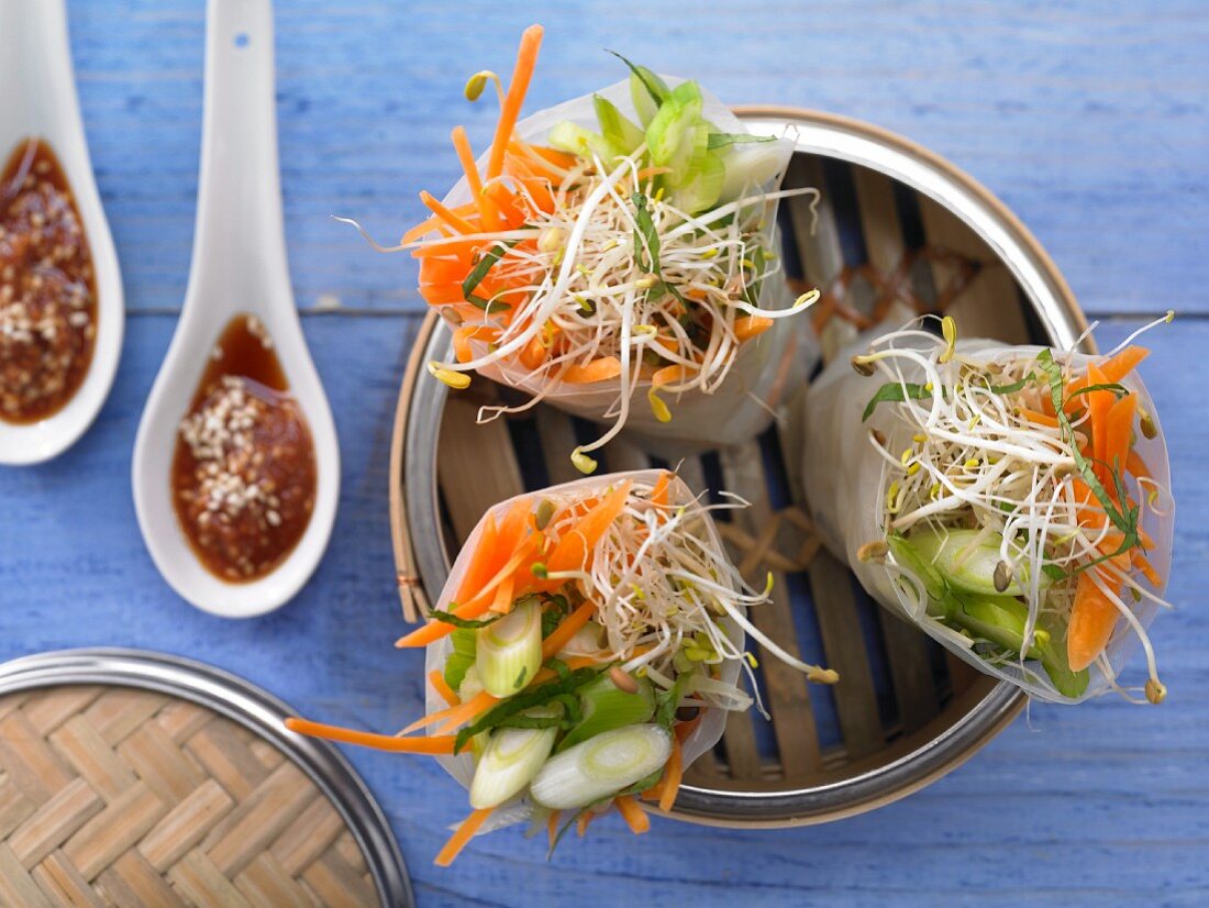 Steamed Asian wraps with sesame ginger sauce