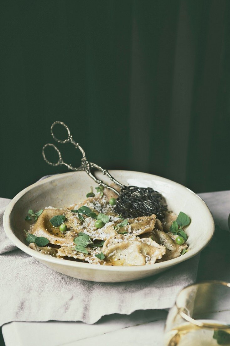 Ravioli with herbs and Parmesan in a vintage setting