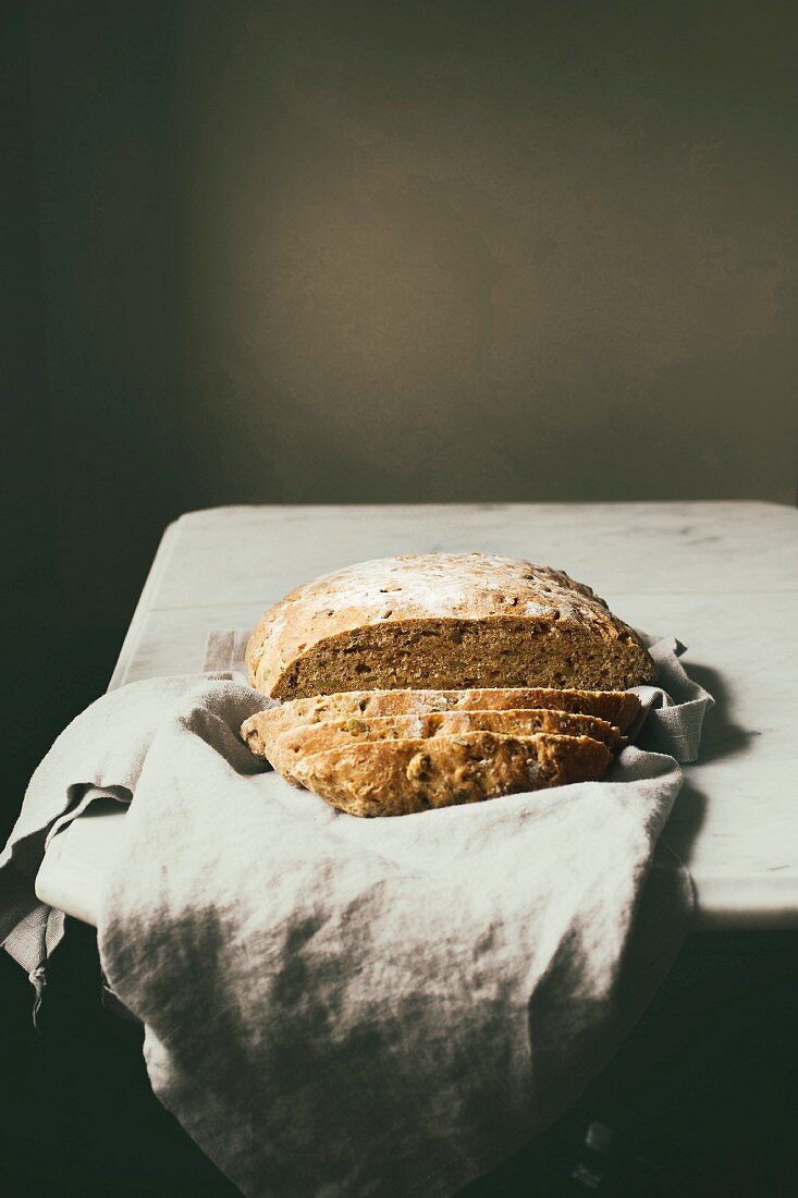 Homemade multi-grain bread cut into slices