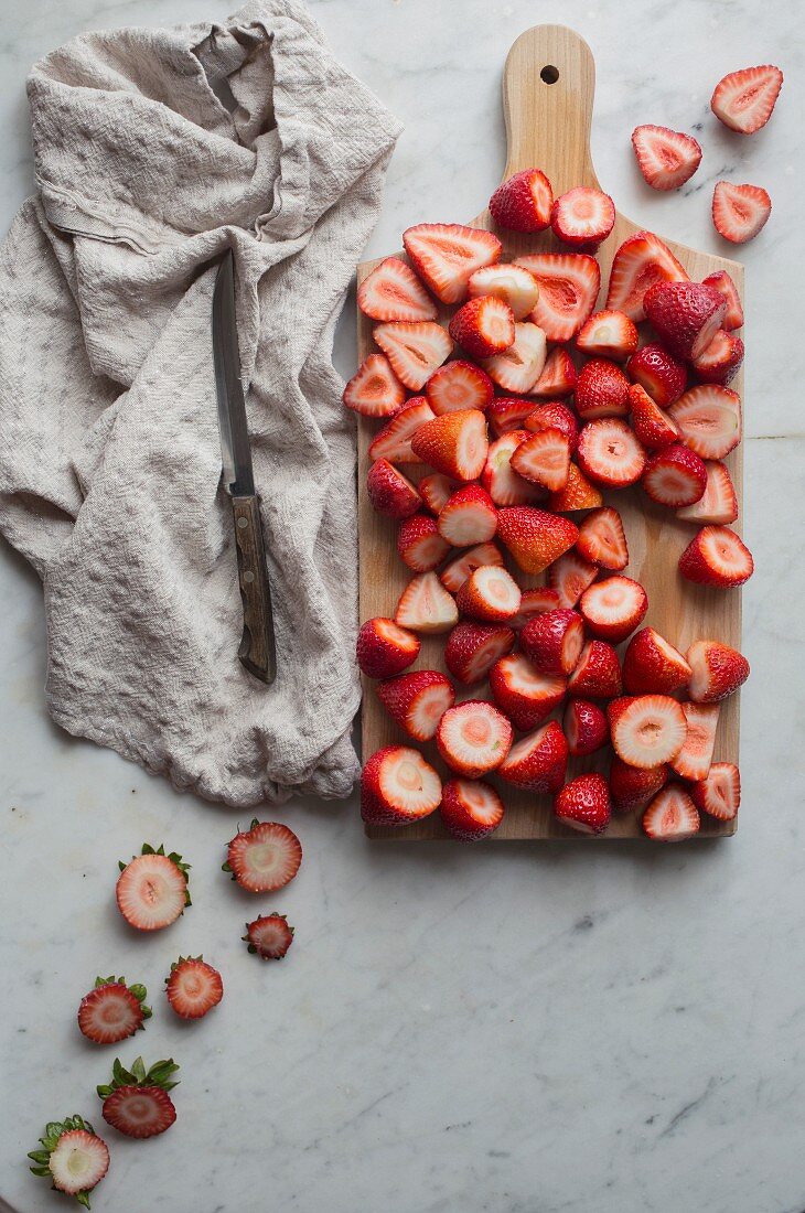 Strawberries on a chopping board, prepared for use