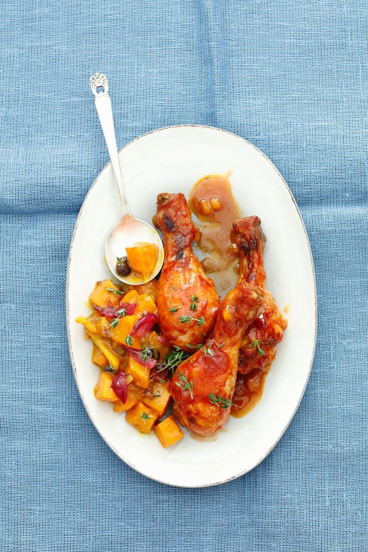 Baked chicken legs with apricot glaze and pumpkin chutney