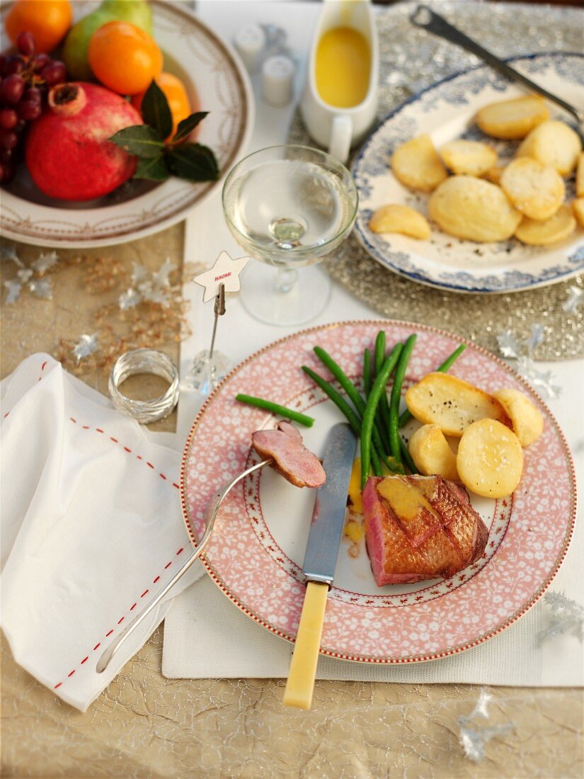 Barbary duck breast with roast potatoes for Christmas