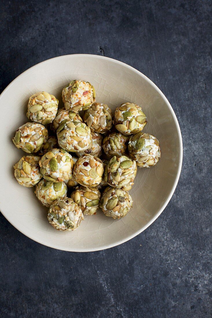 Goats' cheese balls covered in toasted seeds