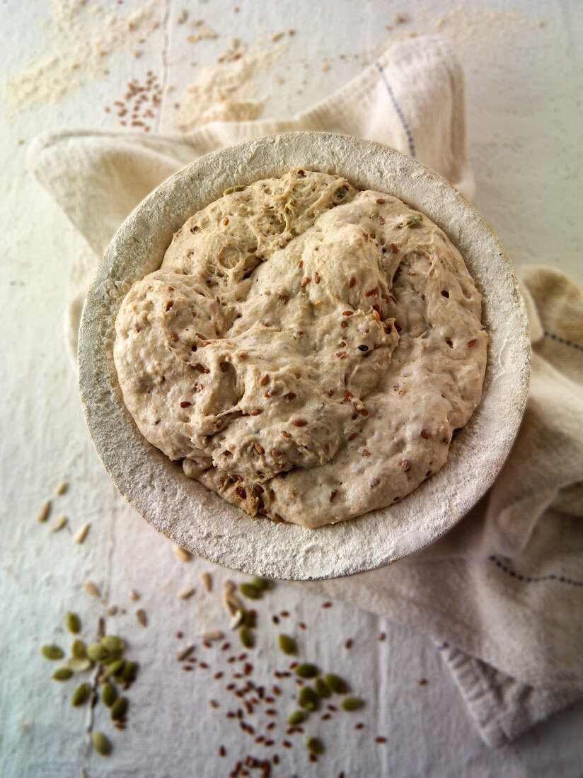 dough for handmade sour dough wholemeal bread in a bowl