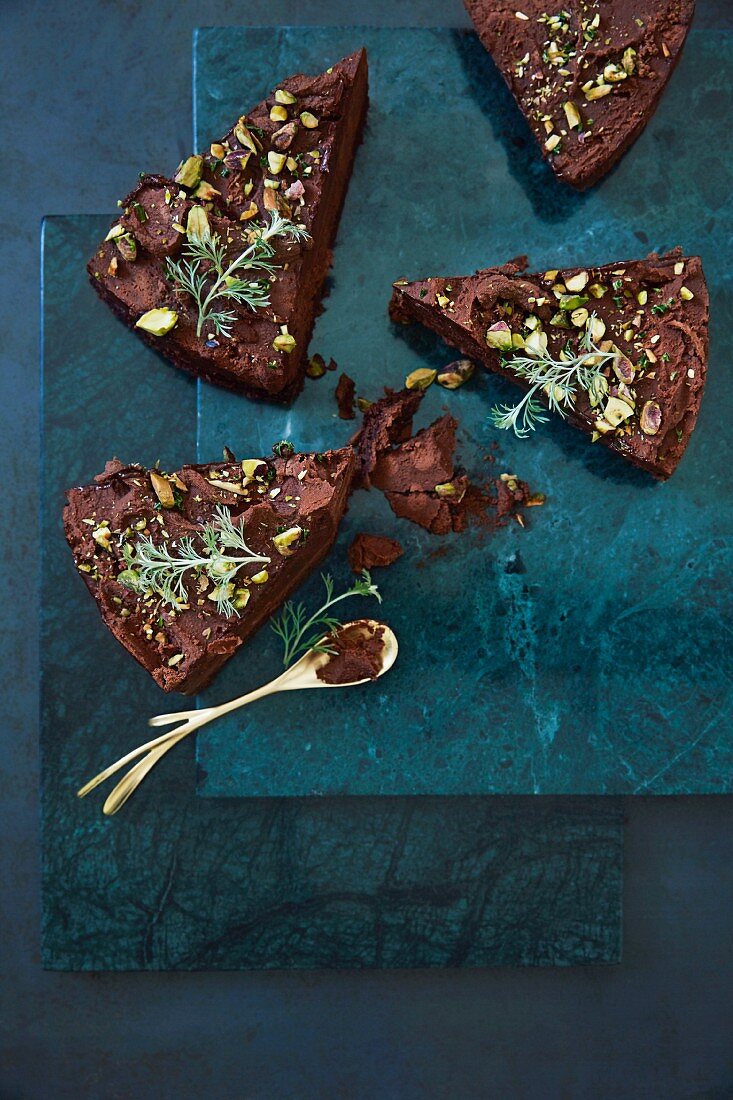 Chocolate cake with green chillies, pistachios, and sea salt
