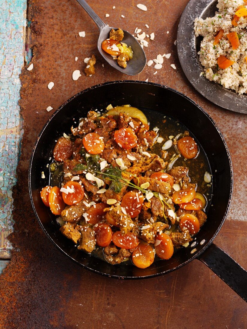 Beef with dried apricots and almond flakes