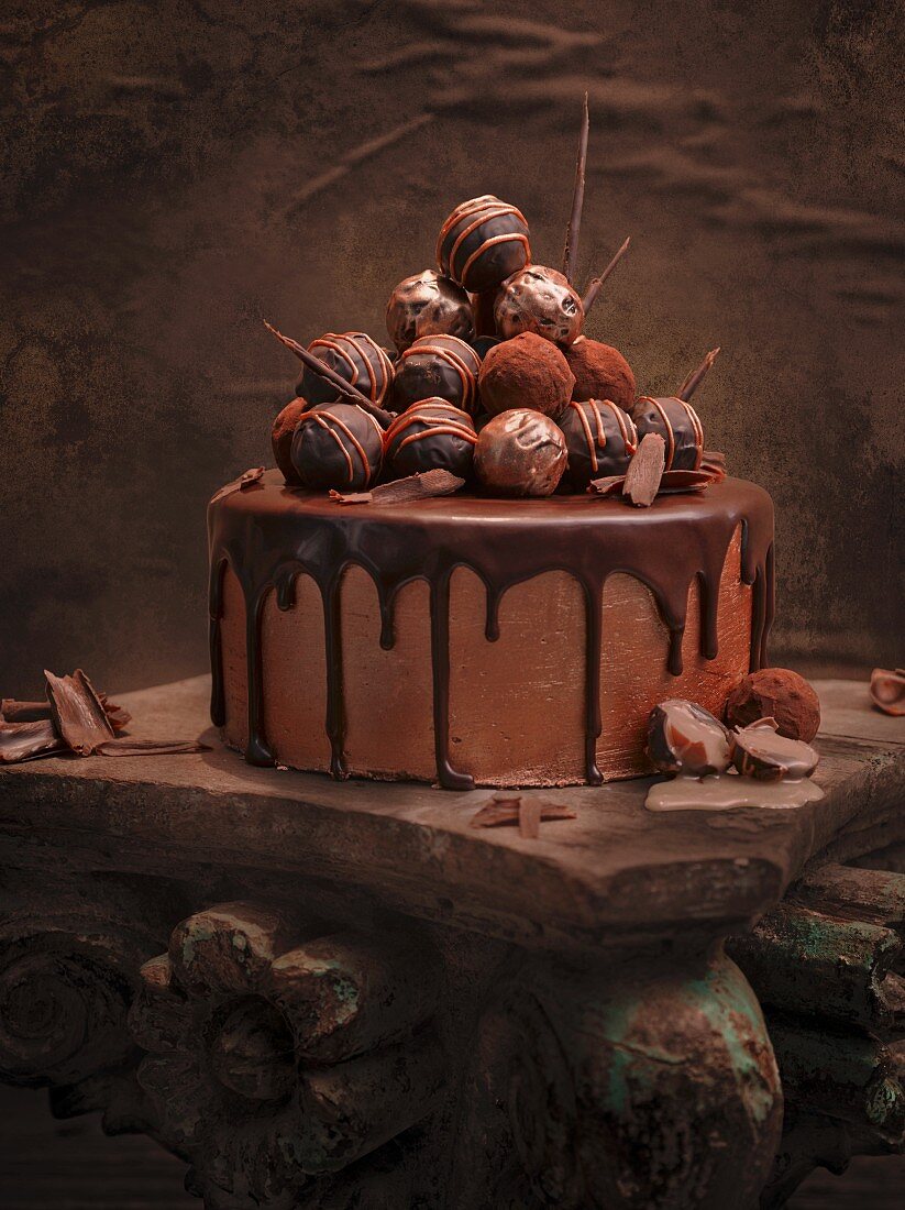 Chocolate truffle cake decorated with pralines