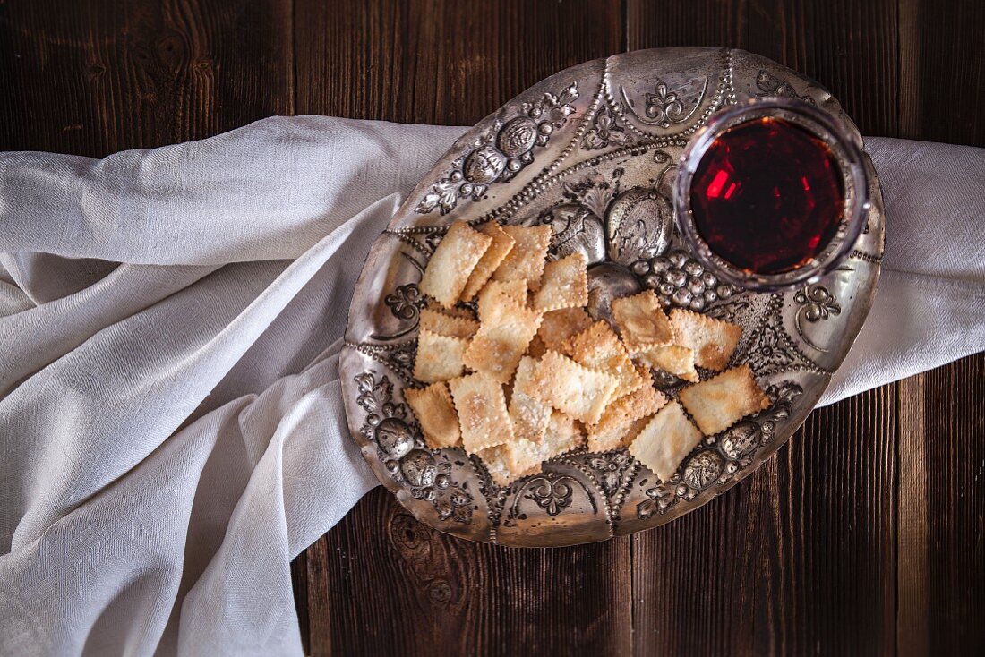 Salty crackers and a wine glass