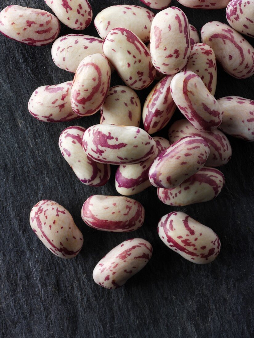 Freshly picked borlotti beans on a slate platter