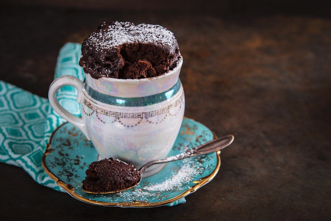 Small chocolate mug cake in a vintage cup