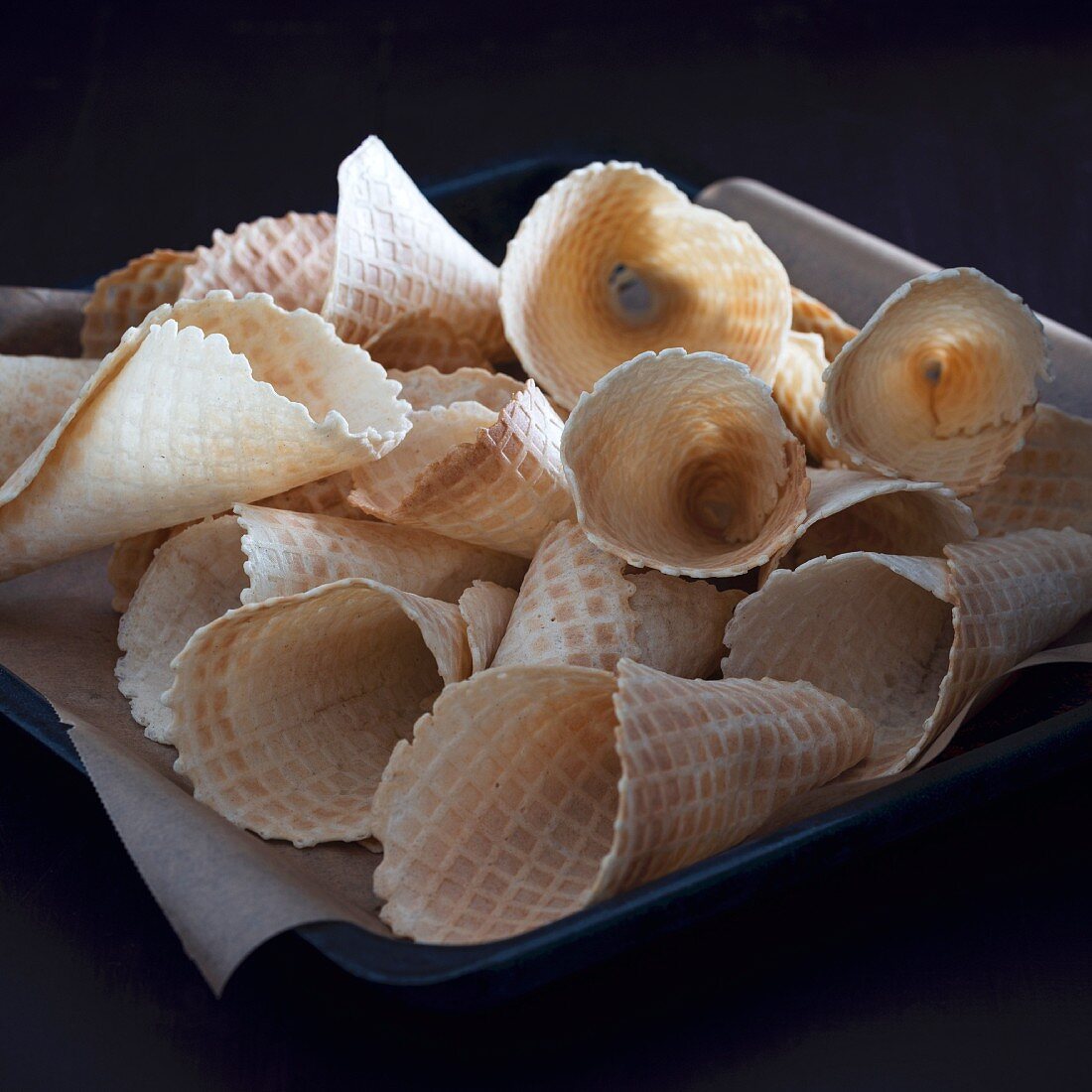 A baking tray with homemade vegan ice cream cones