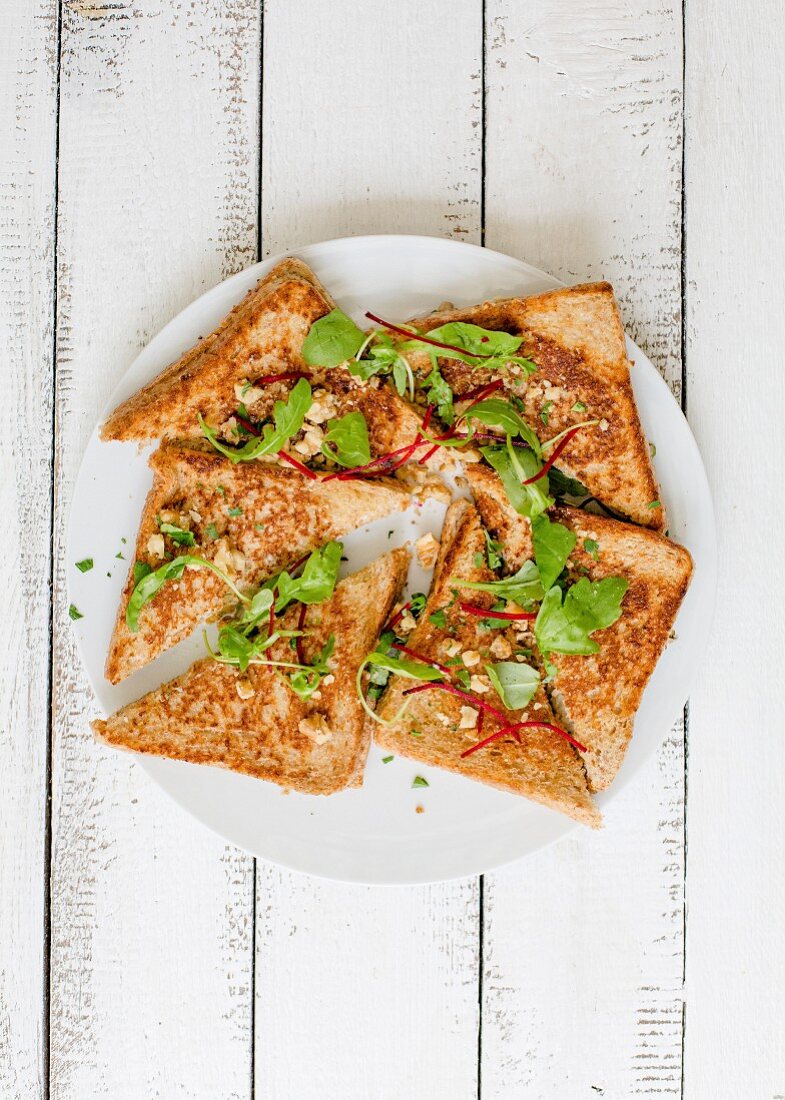 Toasted sandwiches with nuts (seen from above)