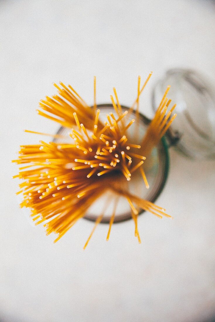 Spaghetti in a glass storage jar (see from above)