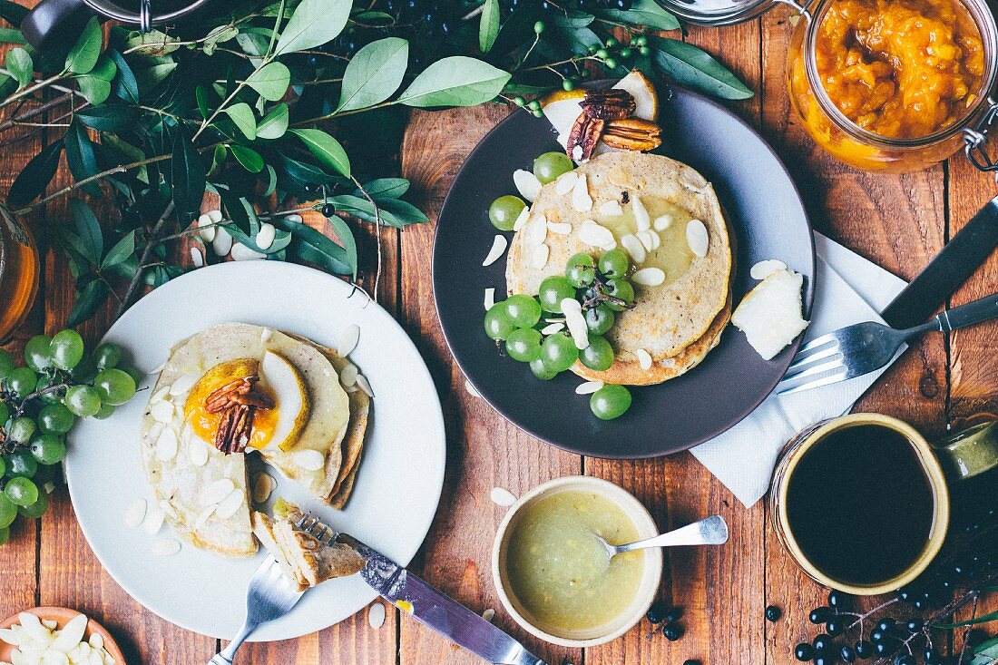 Pancakes with fruit and almond flakes