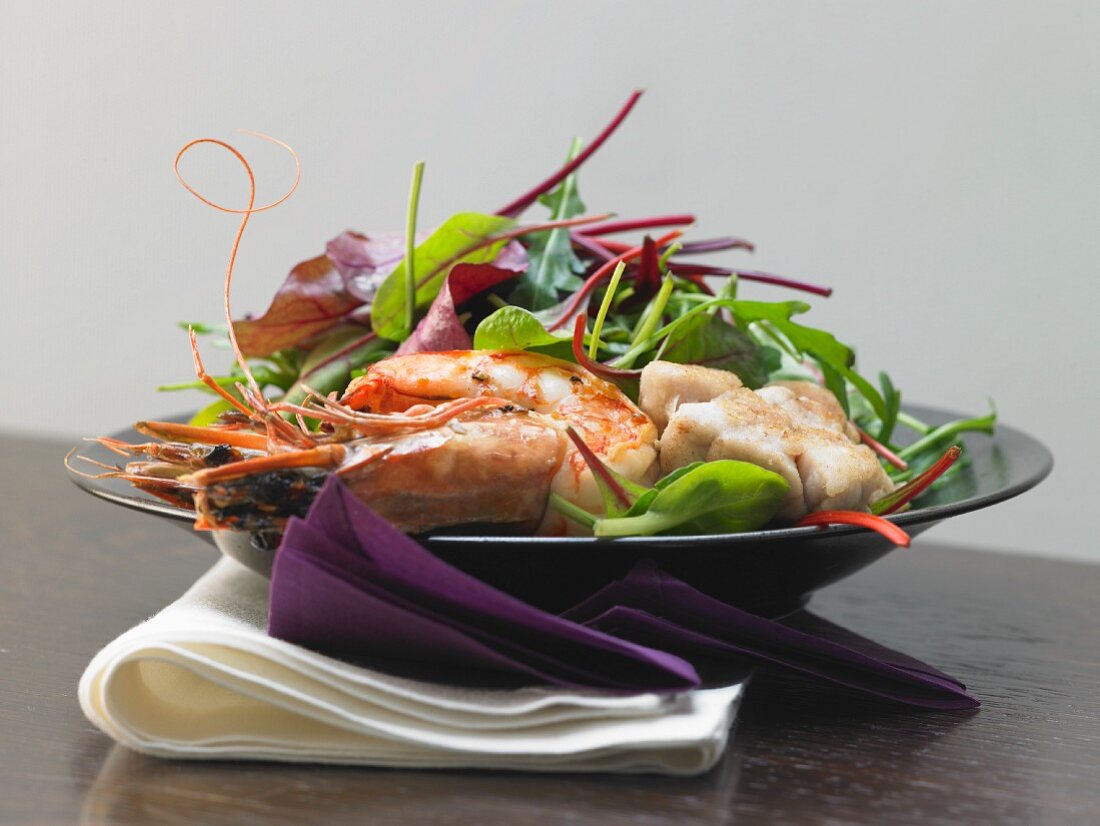 A salad with veal stew and shrimp in vanilla vinaigrette