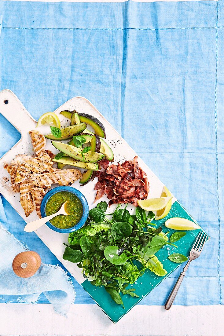 Bacon, chicken, avocado and basil salad with salsa verde