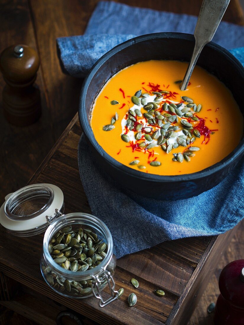 Vegan pumpkin soup with coconut milk and saffron