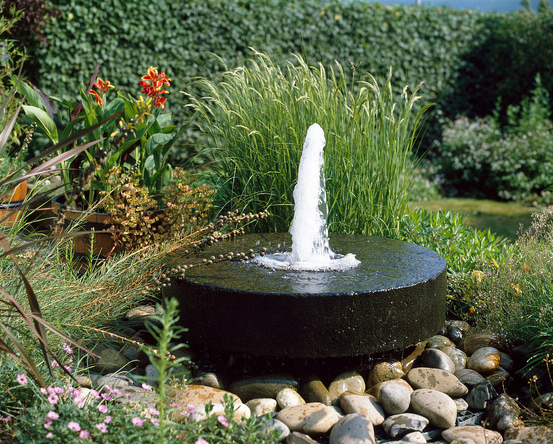 Millstone as a fountain