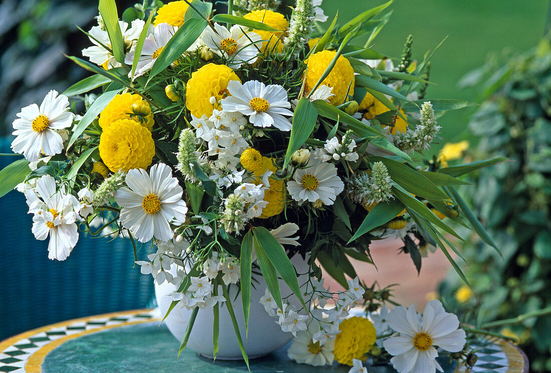 Bouquet of ornamental baskets, dahlias and summer jasmine