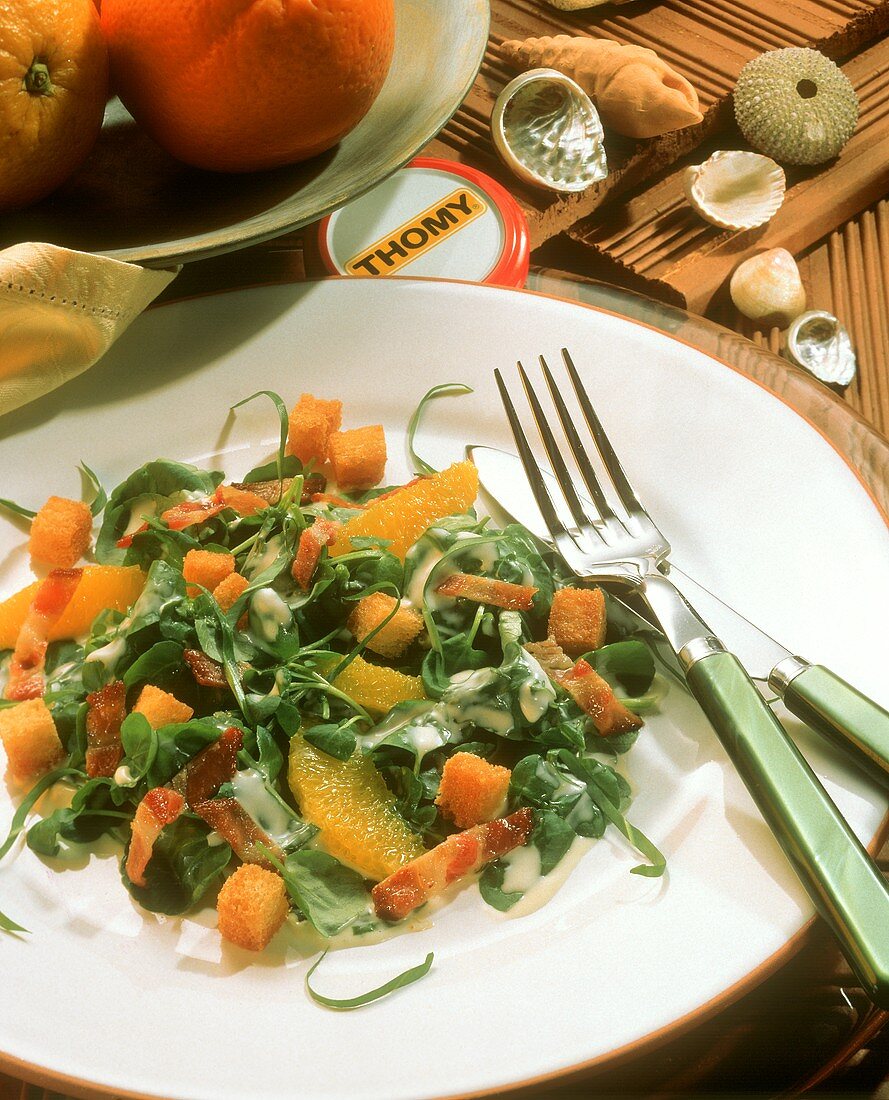 Watercress salad with ramsons, orange segments & bacon