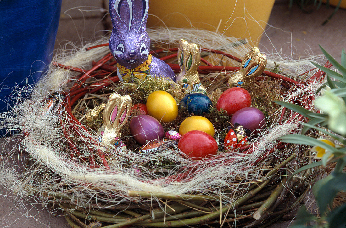 Easter nest made of willow and cornus twigs with sisal