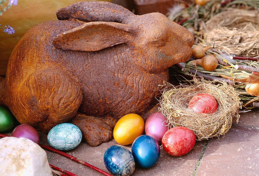 Hare made of iron, Easter nest with coloured eggs