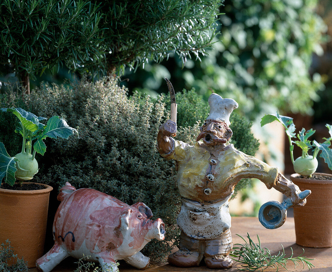 Cook and pig of clay