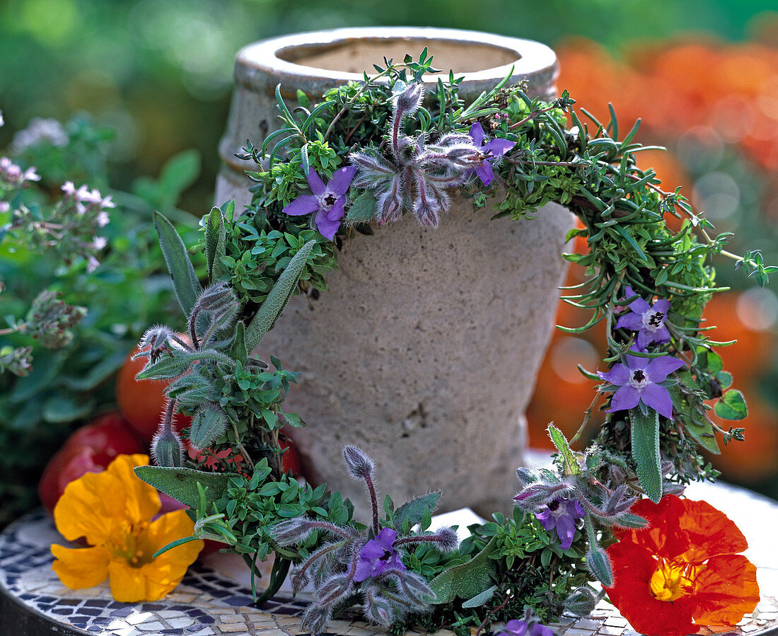 Wreath of herbs from Borago (Borage), Origanum, Salvia