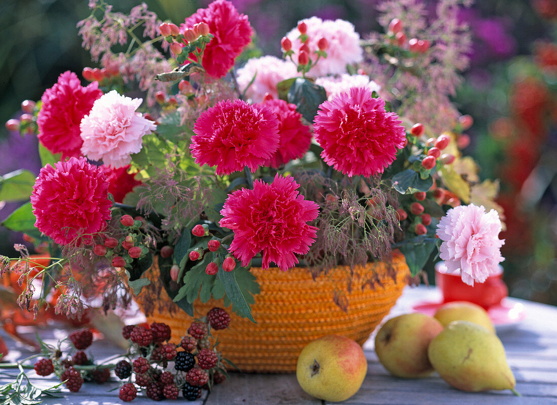 Basket with foil and cuttings, Dianthus (carnations), Hypericum