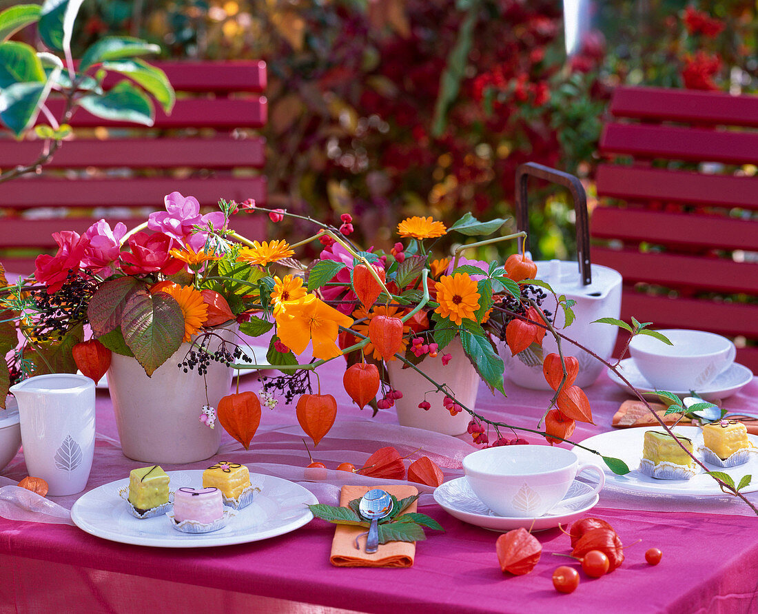 Table decoration: Pink (roses), Calendula (marigolds), Physalis