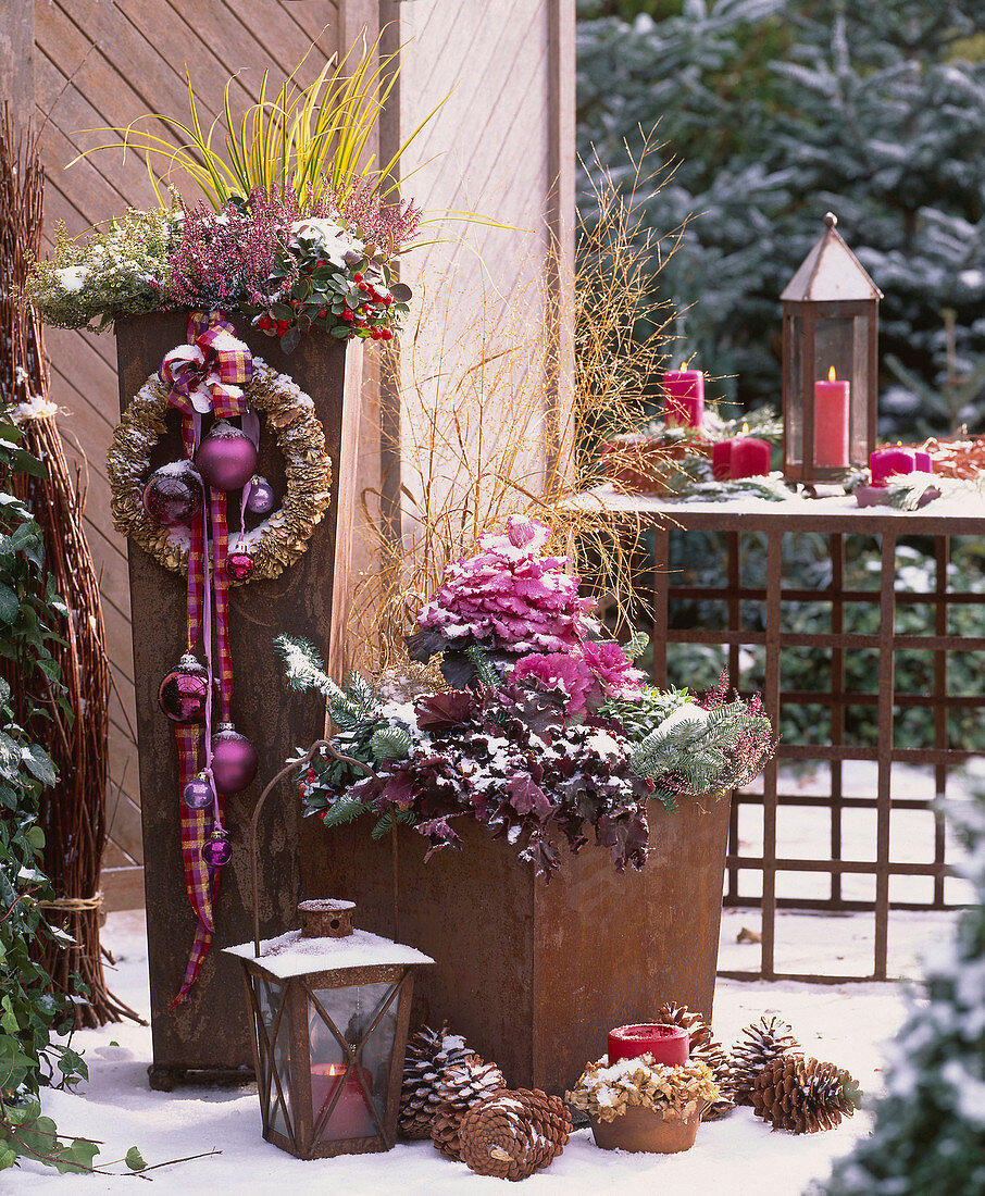 Christmas terrace decoration in rust containers