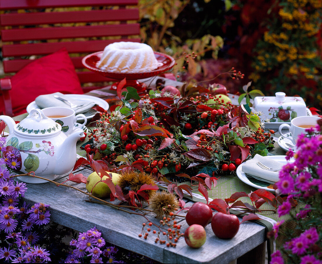 Table wreath of parthenocissus (grapevine and berry ornaments)