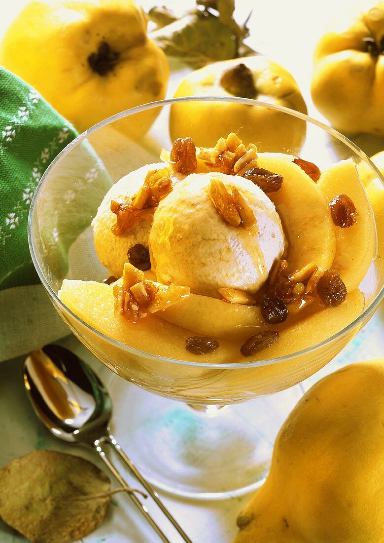 Quince ice cream with stewed quince slices, raisins & almonds