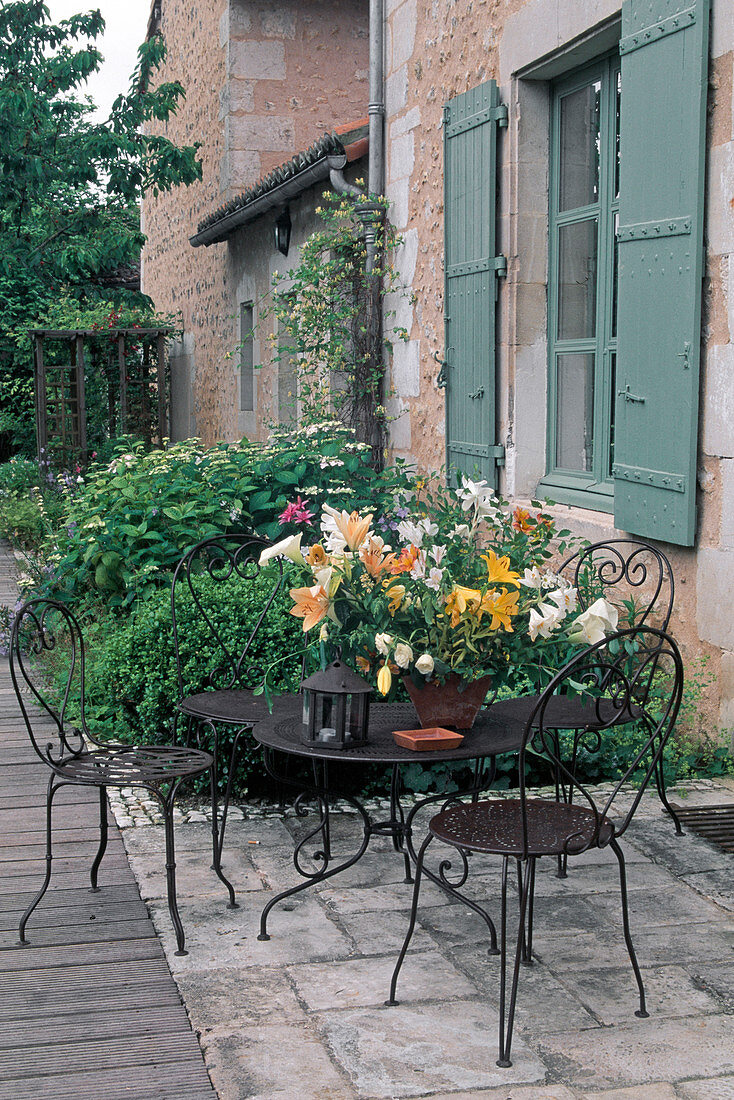 Seat in summer, shady terrace by the house