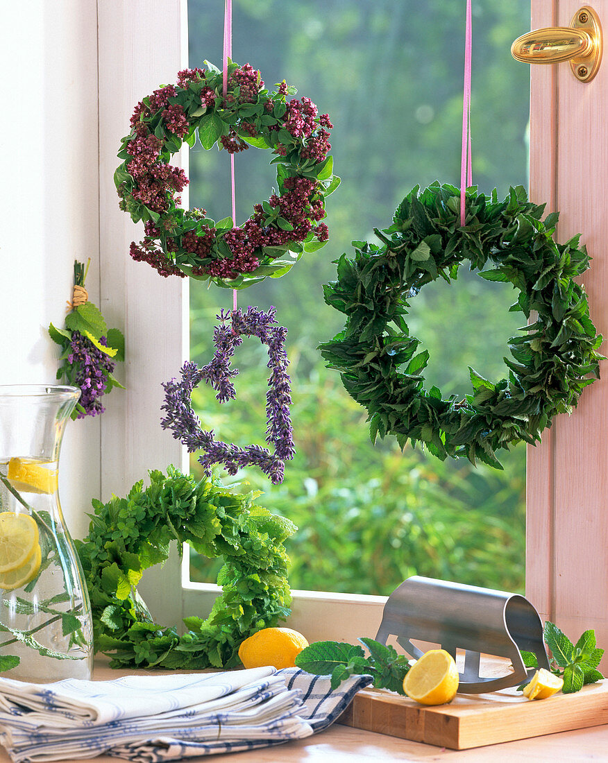 Herbal wreaths on the kitchen window