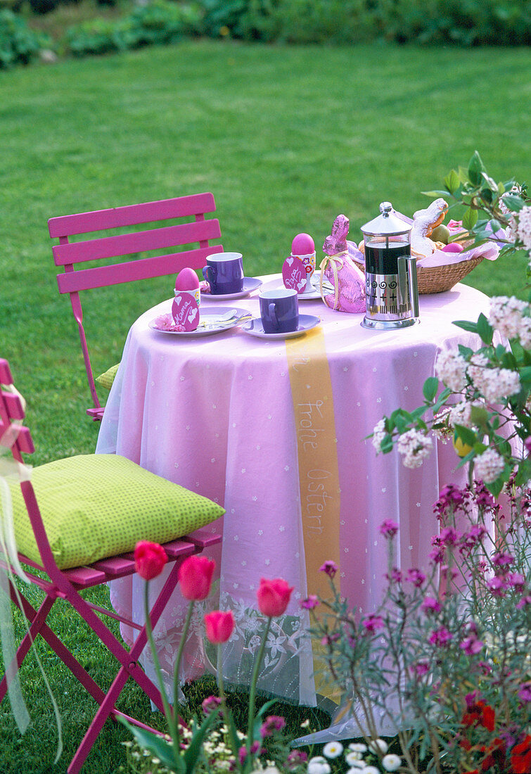 Pink Easter table with eggs for mum and dad