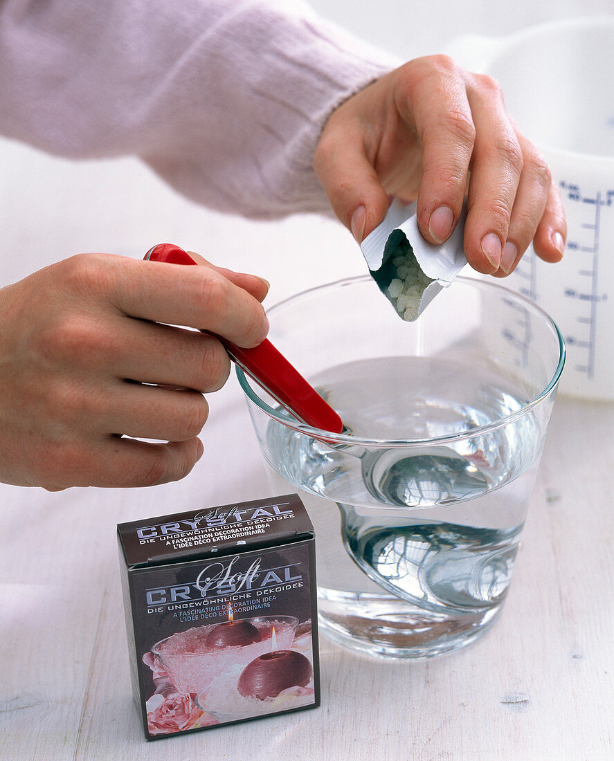 Stir water-storing granules into glass with water