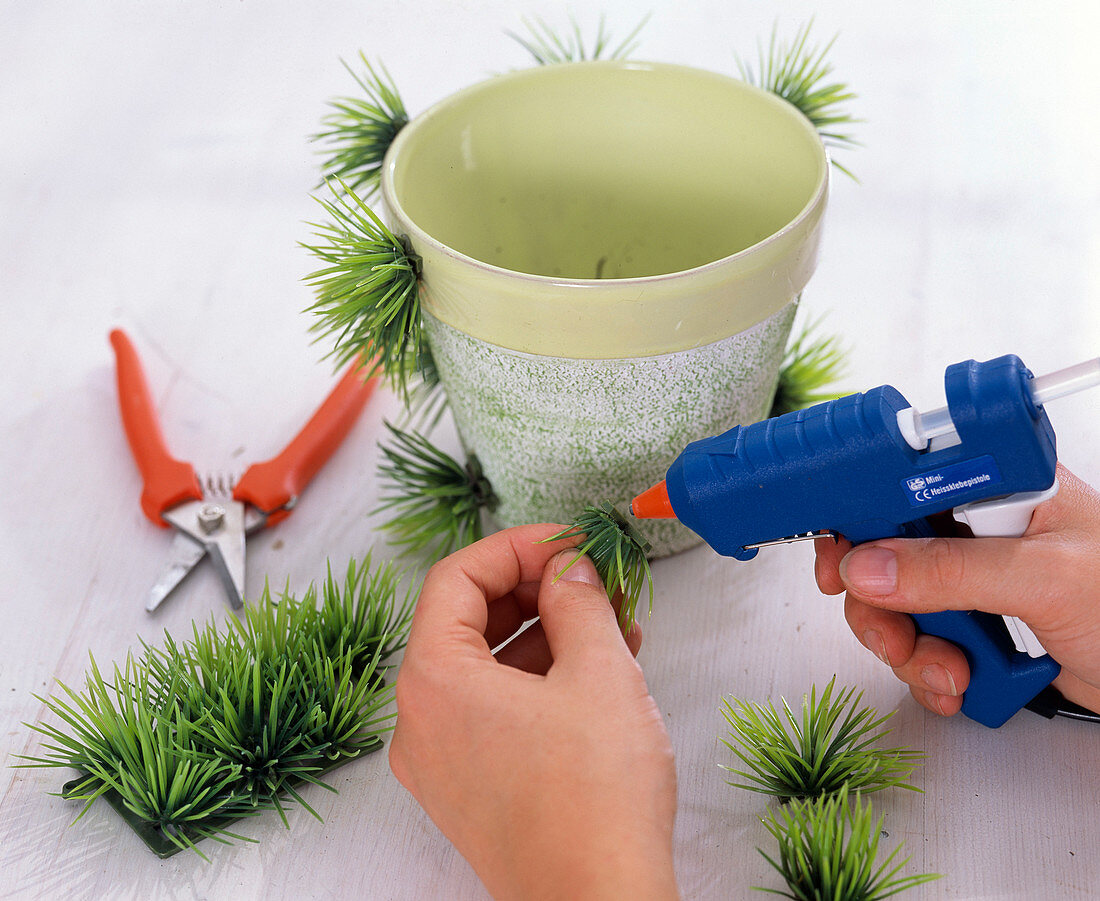 Planter with artificial grass