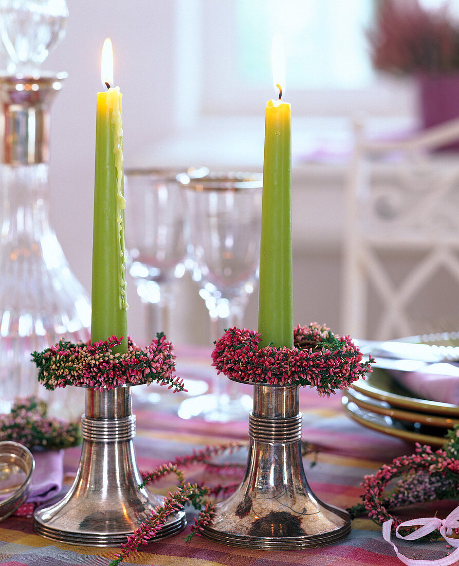 Candle rings made of calluna (heather), green candles, silver candlesticks