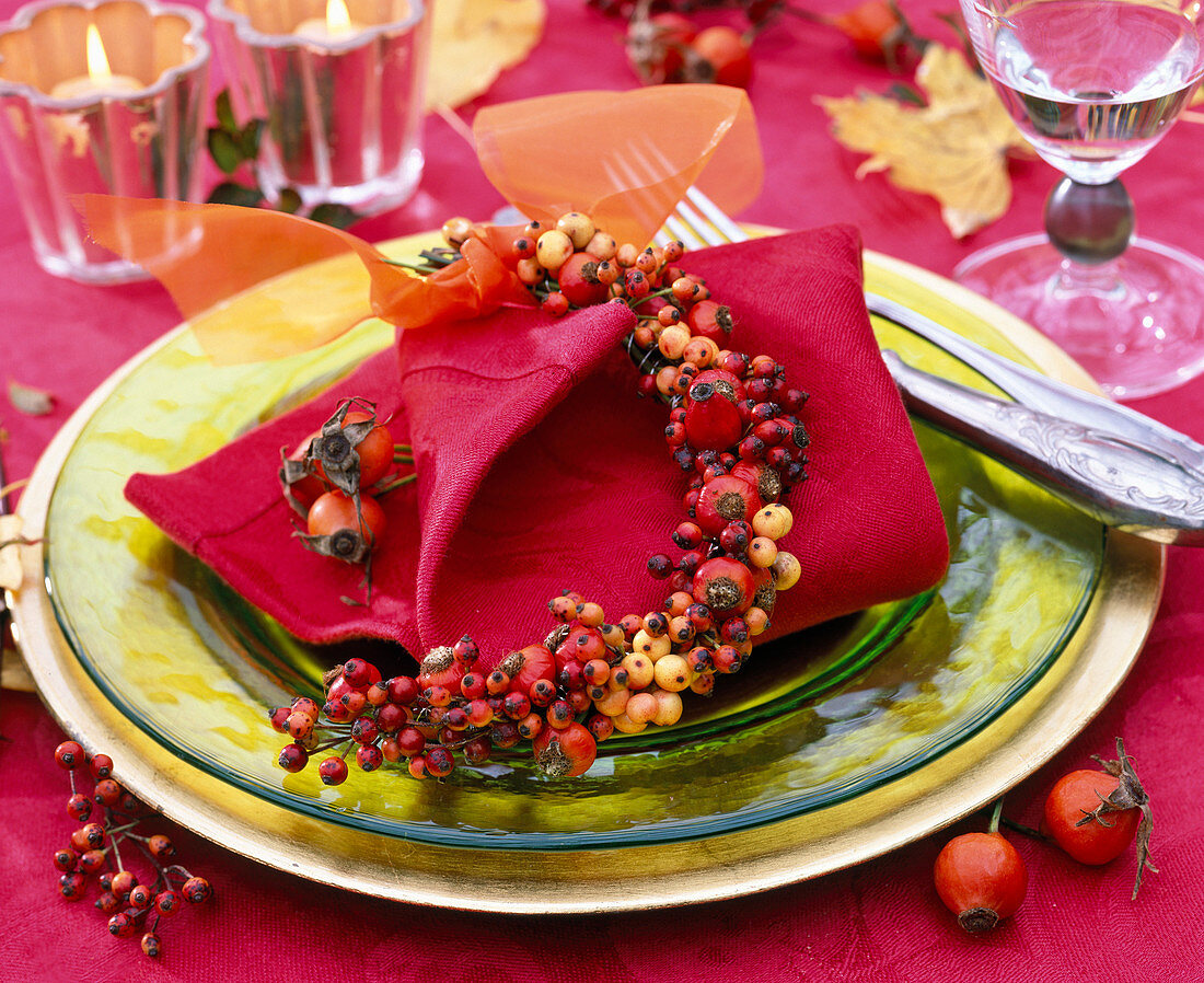 Rose, Ilex, mini garland on red napkin