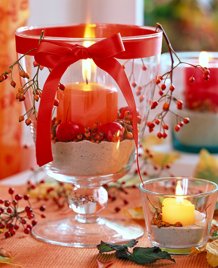 Rose, Malus, glass cup with sand, orange candle