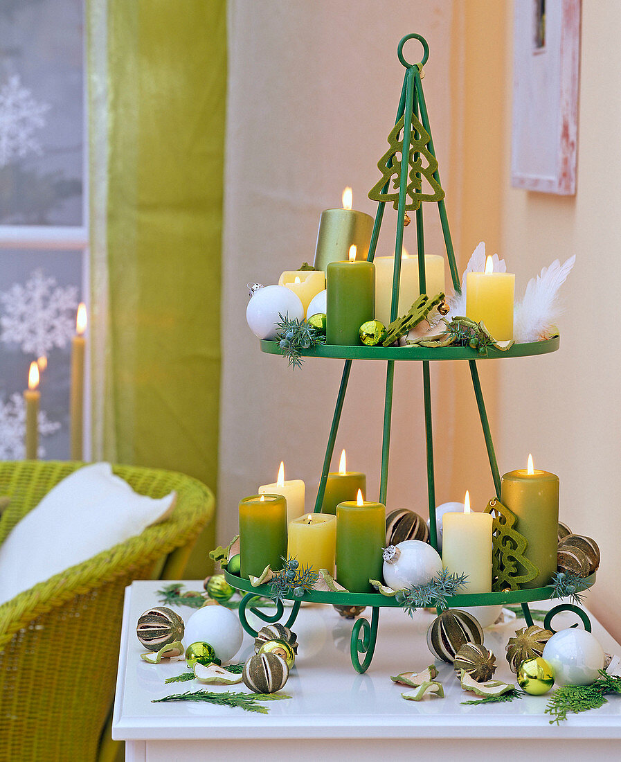 Metal tray painted green with green candles