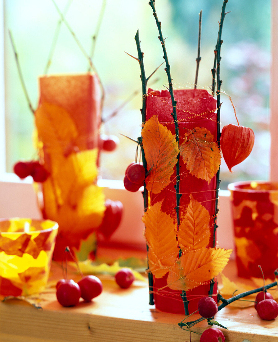 Tall glass as a lantern with tissue paper