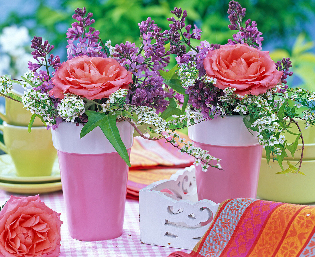 Bouquets of Rose, syringa, spiraea