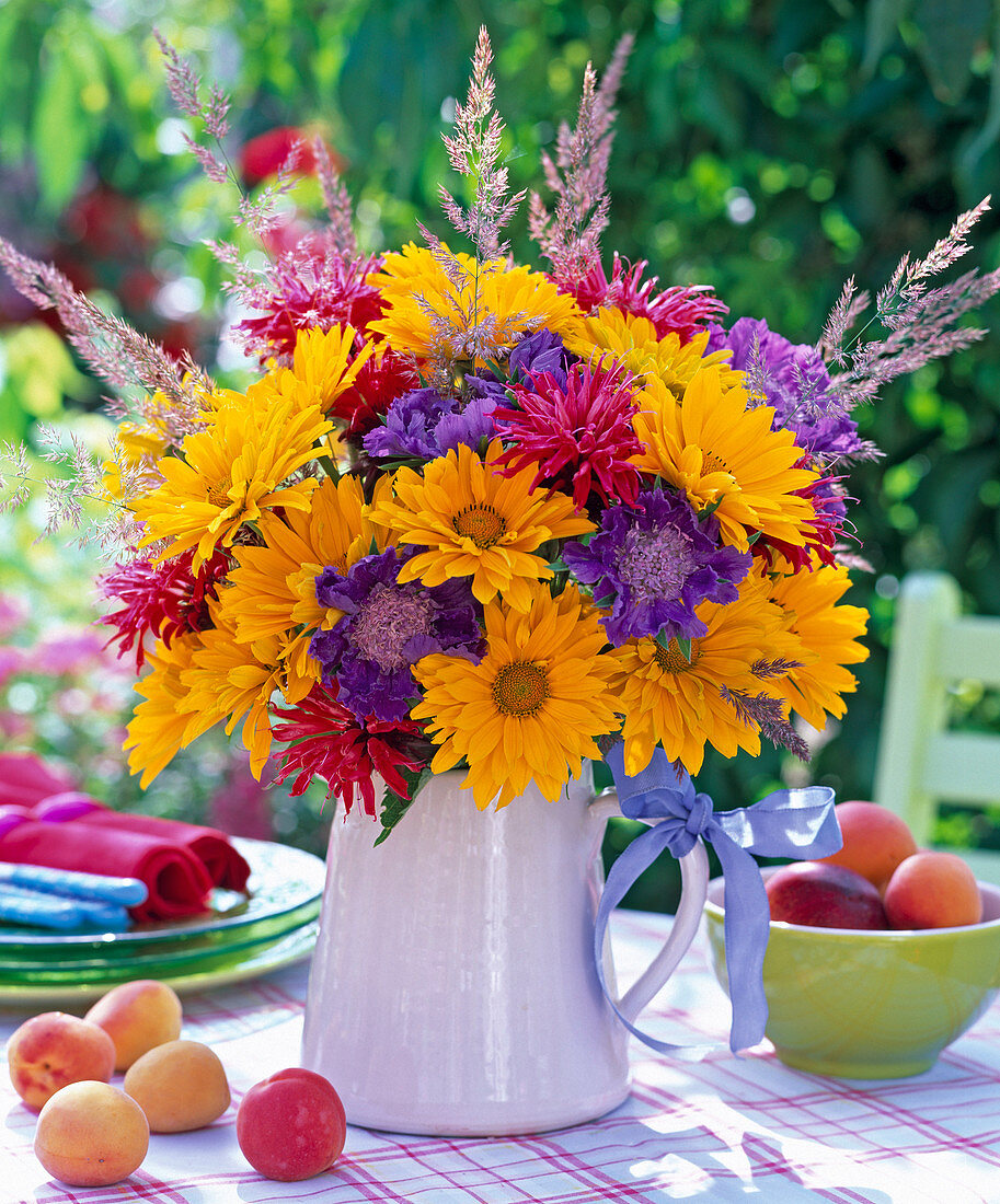 Bouquet of heliopsis, scabiosa, monarda